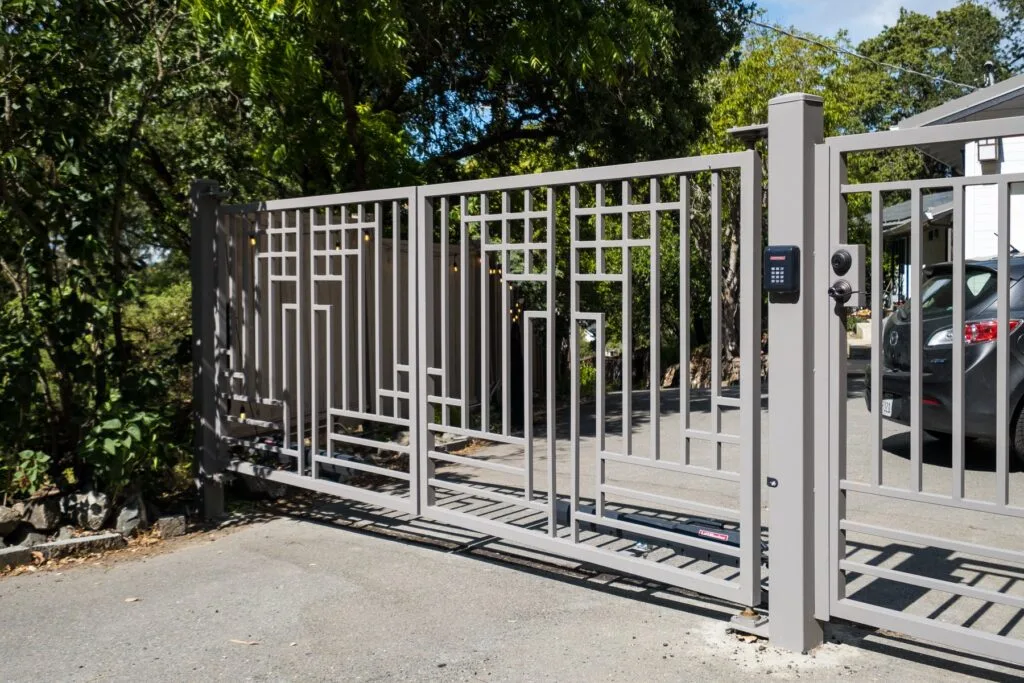 Silver residential access gate with control system